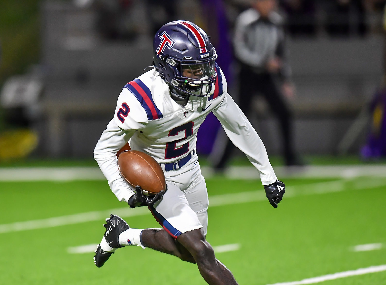 Houston Tx. Nov 19, 2021: Tompkins #2 Joshua Mcmillan ii carries the ball during the UIL area playoff game between Tompkins and Jersey Village at Pridgeon Stadium in Houston. (Photo by Mark Goodman / Katy Times)