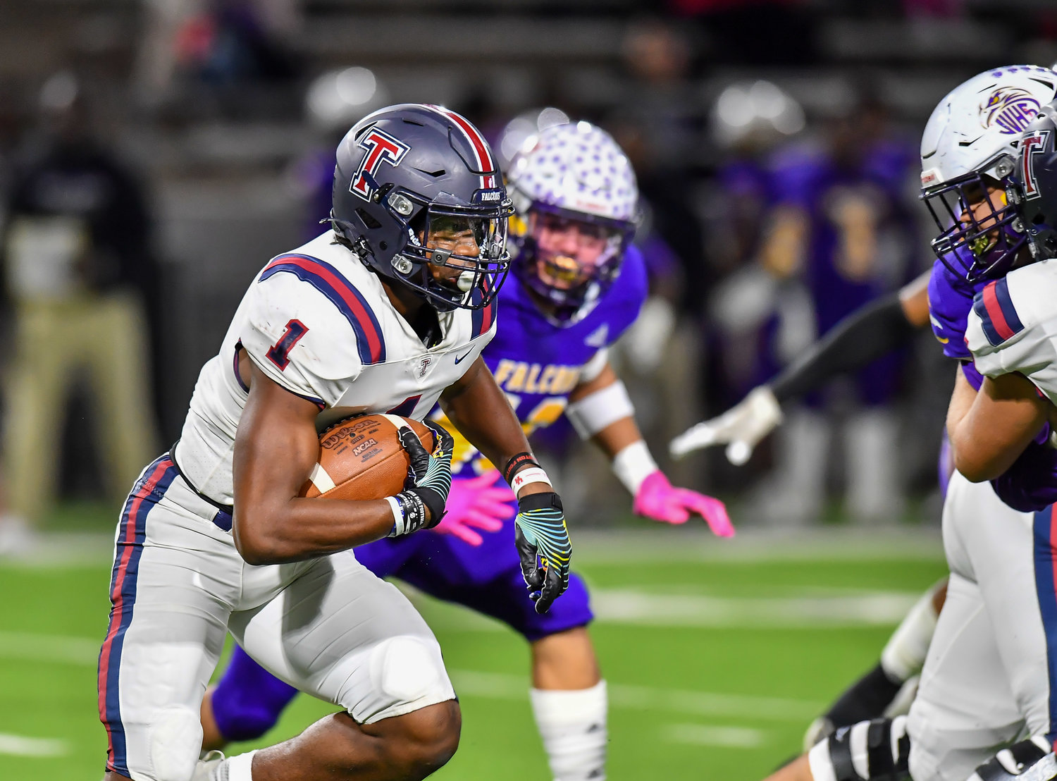 Houston Tx. Nov 19, 2021: Tompkins #1 Caleb Komolafe carries the ball during the UIL area playoff game between Tompkins and Jersey Village at Pridgeon Stadium in Houston. (Photo by Mark Goodman / Katy Times)