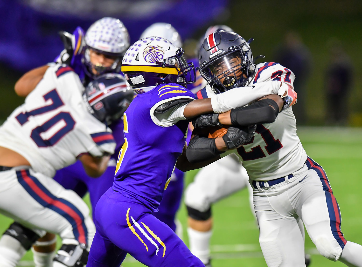 Houston Tx. Nov 19, 2021: Tompkins #21 Caleb Blocker rushes to the outside during the UIL area playoff game between Tompkins and Jersey Village at Pridgeon Stadium in Houston. (Photo by Mark Goodman / Katy Times)