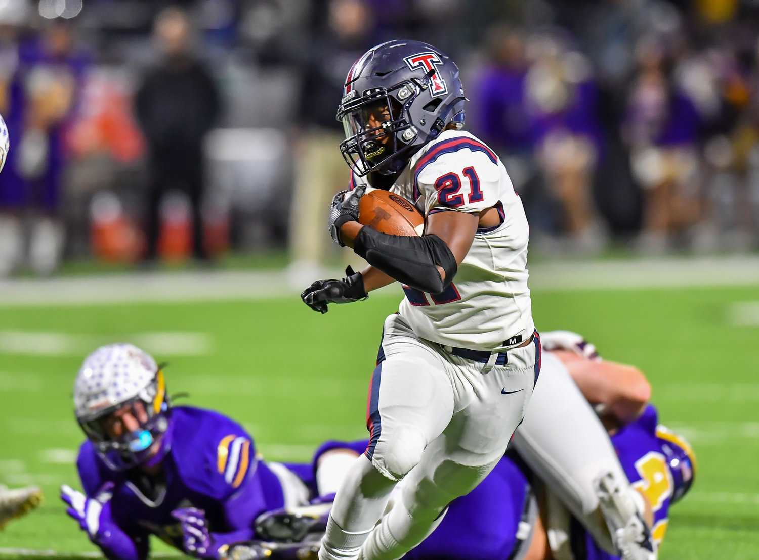 Houston Tx. Nov 19, 2021: Tompkins #21 Caleb Blocker rushes in for a TD during the first half of the UIL area playoff game between Tompkins and Jersey Village at Pridgeon Stadium in Houston. (Photo by Mark Goodman / Katy Times)