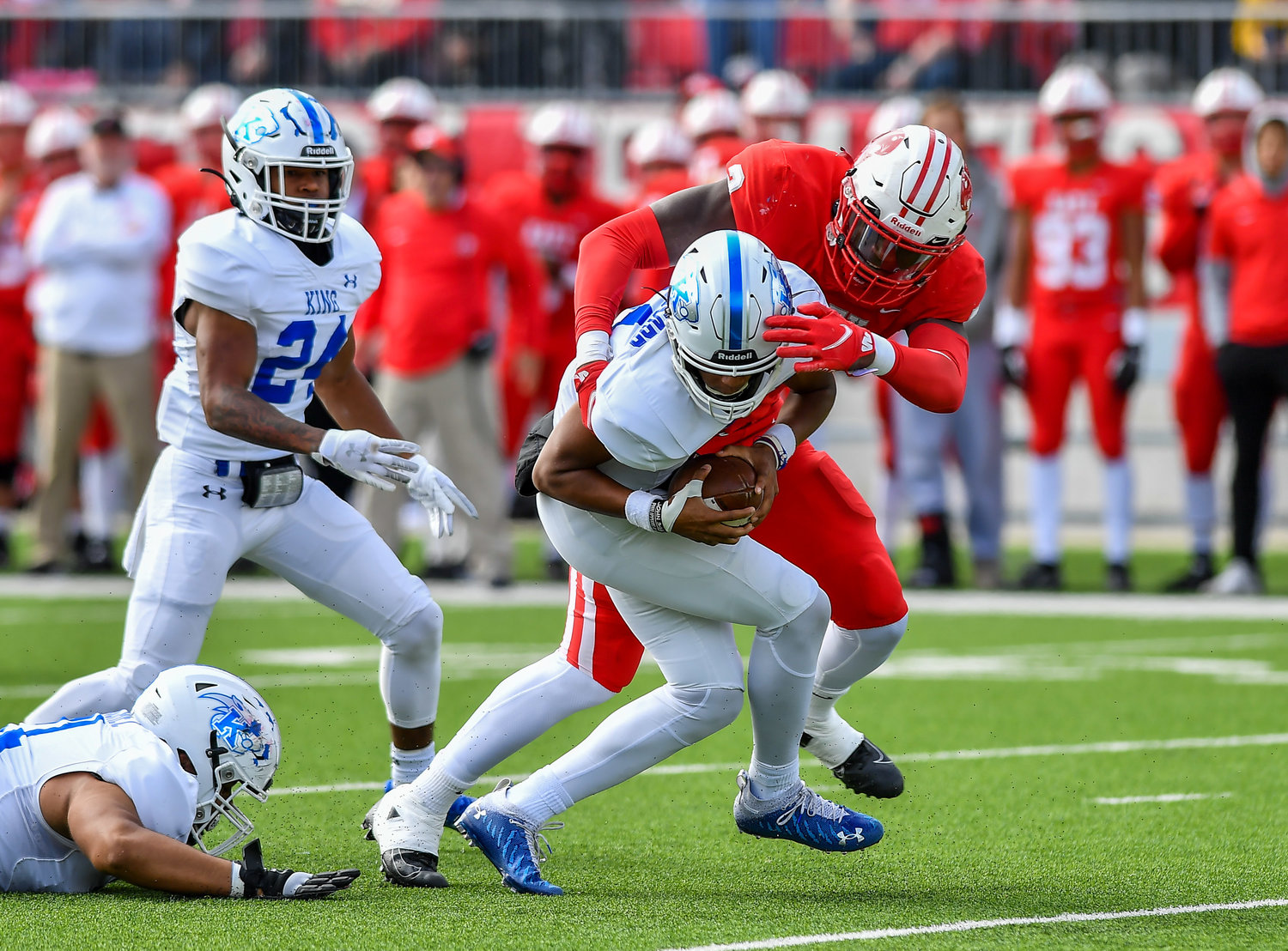 Katy Tx. Nov 26, 2021: Katy's #2 Malik Sylla gets the sack on King Panthers QB Nehemiah Brousard #11 during the UIL regional playoff game between Katy Tigers and King Panthers at Legacy Stadium in Katy. (Photo by Mark Goodman / Katy Times)