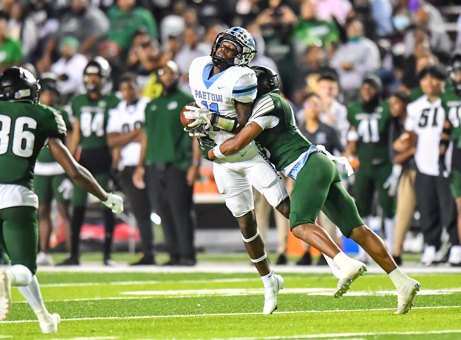 Houston, Tx. Dec 3, 2021: Paetow's Kole Wilson #11 makes the reception during the quarterfinal playoff game between Paetow and F,B. Hightower at Rice Stadium in Houston. (Photo by Mark Gooman / Katy Times)