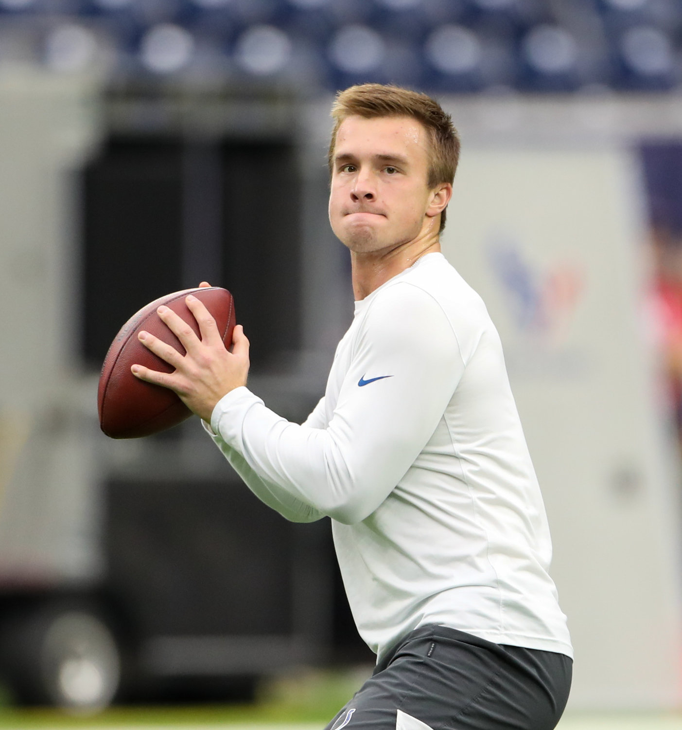 Indianapolis Colts and former Texas Longhorn and Westlake Chaparral quarterback Sam Ehlinger (4) warms up before an NFL game between the Texans and the Colts on December 5, 2021 in Houston, Texas.