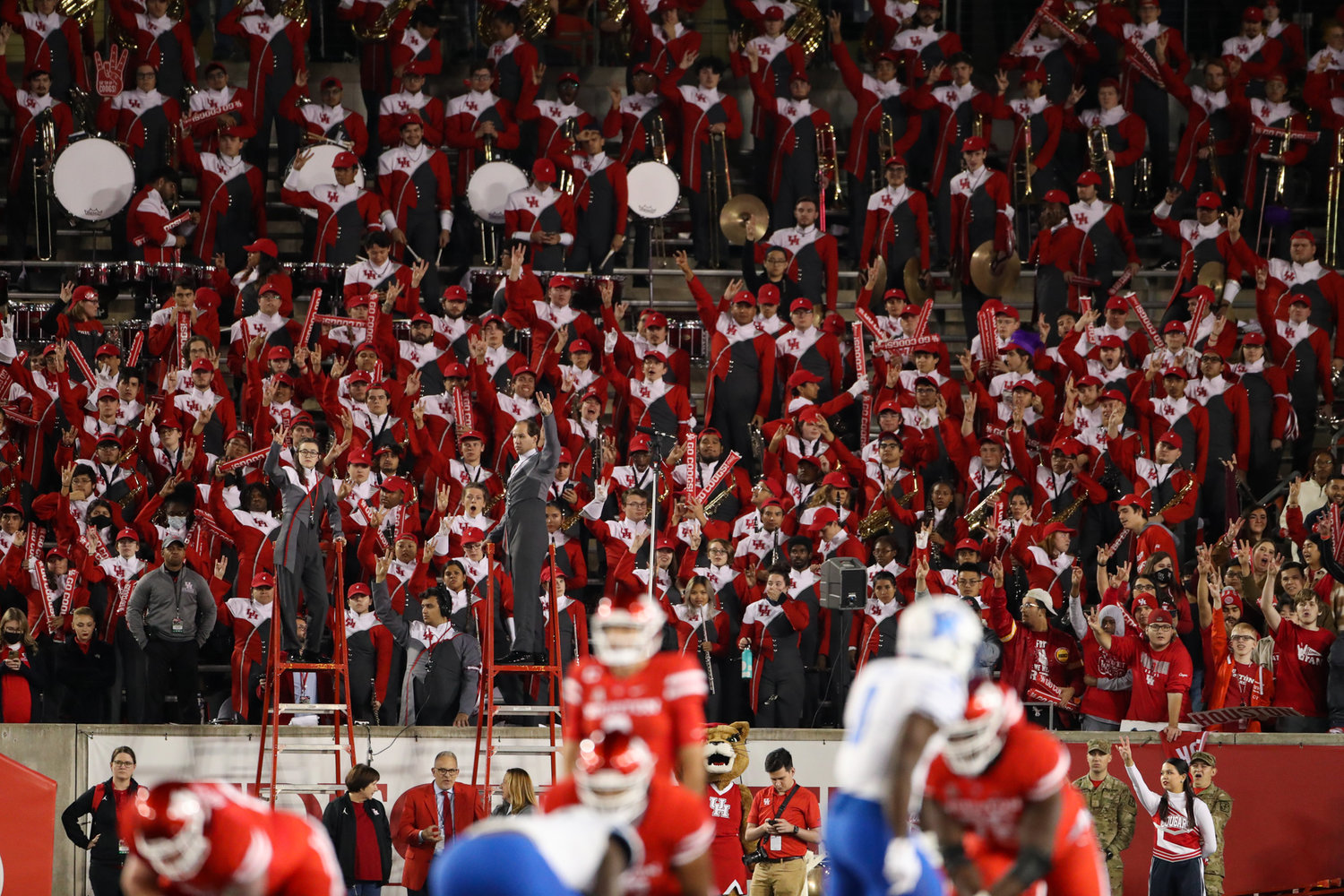 The Houston Cougars band performs during an NCAA football game between Memphis and Houston on November 19, 2021 in Houston, Texas.
