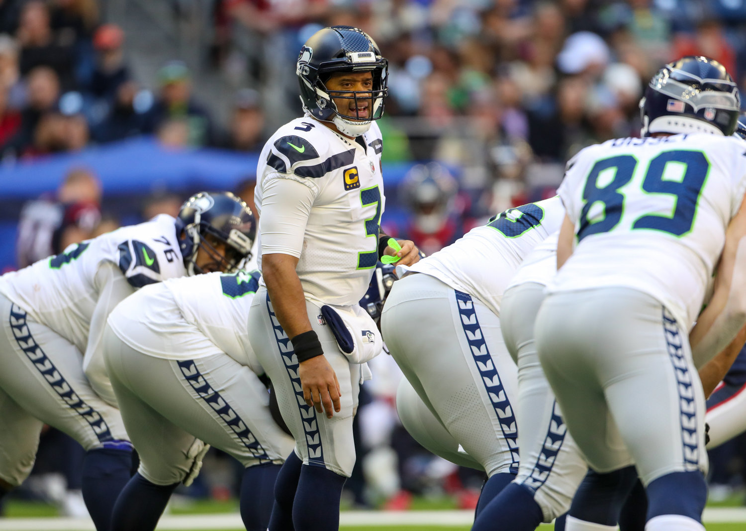 Seattle Seahawks quarterback Russell Wilson (3) at the line of scrimmage during the second half of an NFL game between the Seahawks and the Texans on December 12, 2021 in Houston, Texas.