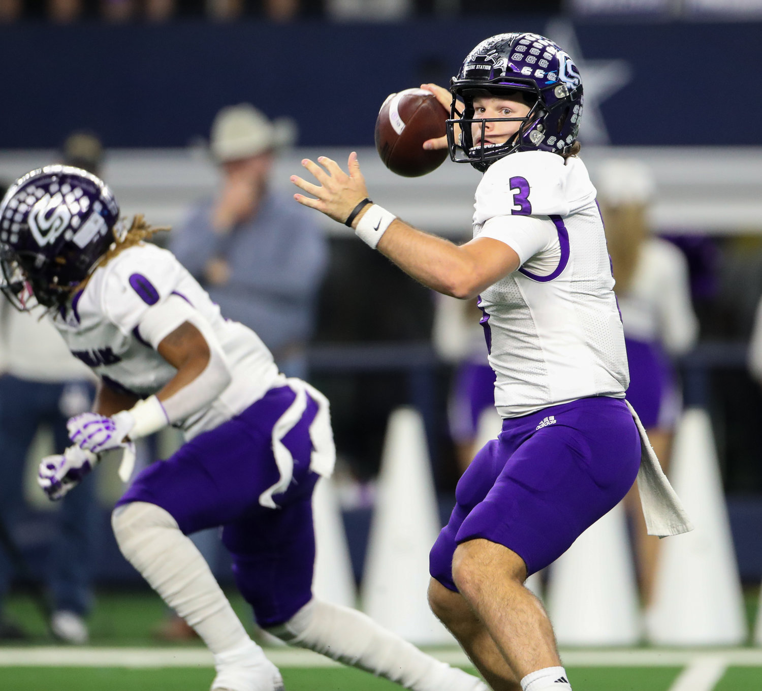 College Station Cougars quarterback Jett Huff (3) passes the ball during the Class 5A-Division I state football championship game between Paetow and College Station on December 17, 2021 in Arlington, Texas.