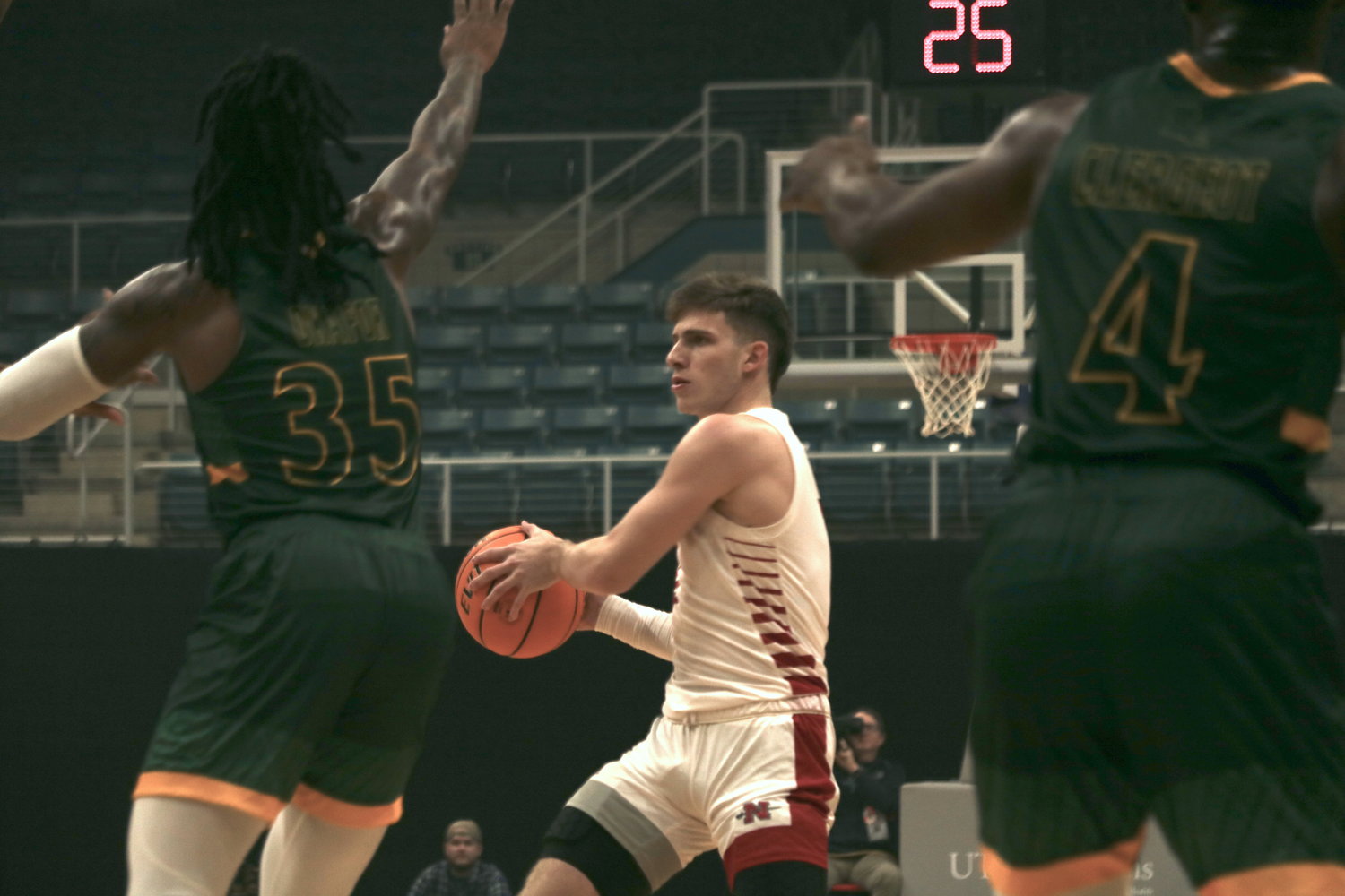 Pierce Spencer looks to pass during Saturdays Southland Tip-Off Final between Southeastern Louisiana University and Nicholls State University at the Merrell Center.