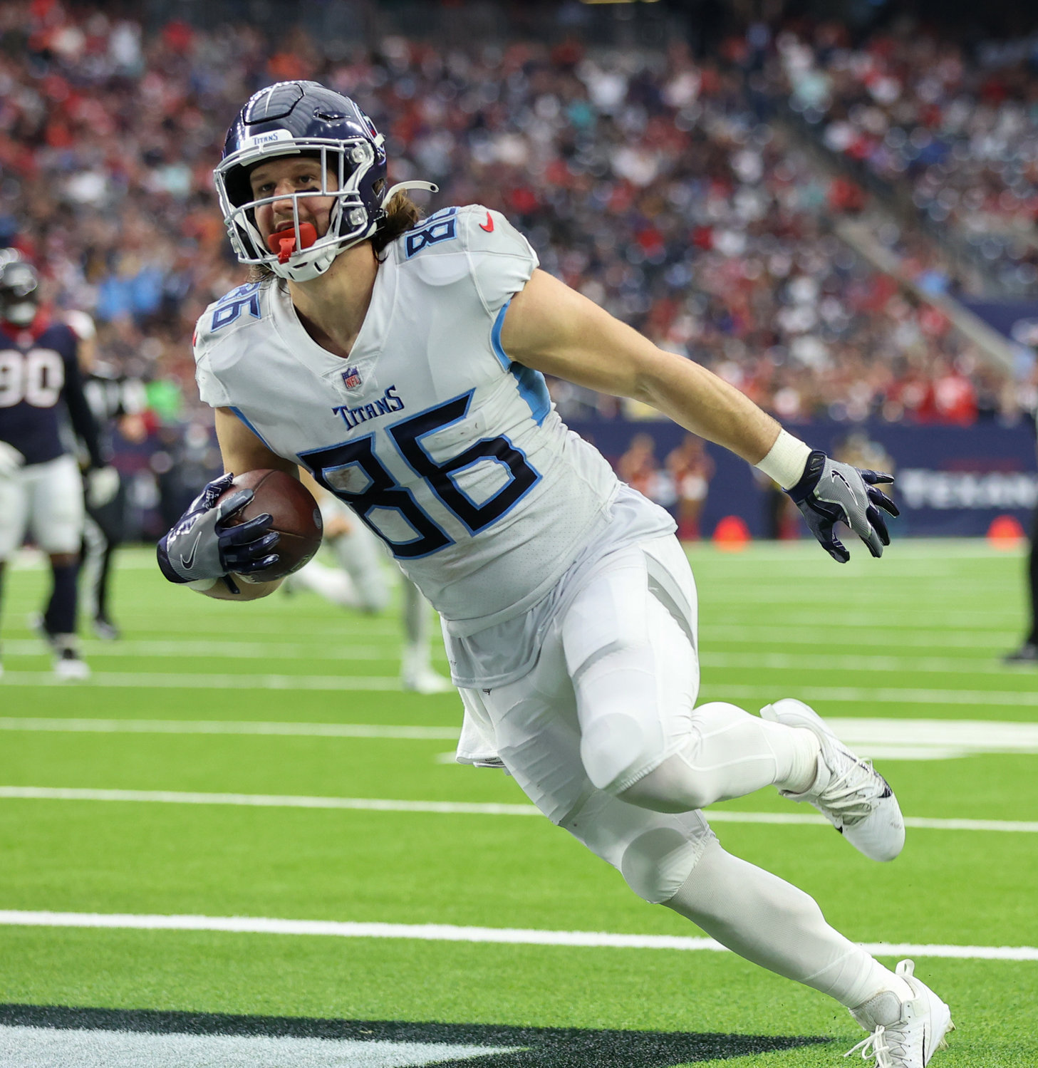 Tennessee Titans tight end Anthony Firkser (86) scores on a 5-yard touchdown catch in the second quarter of an NFL game between the Texans and the Titans on Jan. 9, 2022 in Houston, Texas. The Titans won, 28-25.