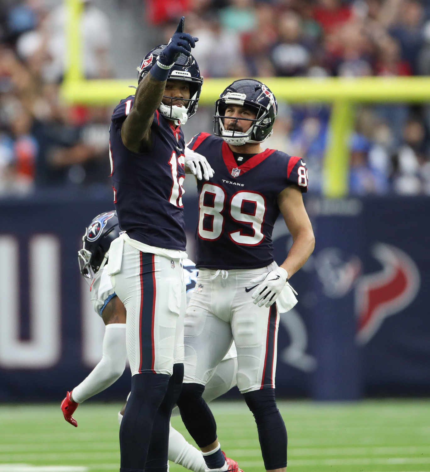 Houston Texans wide receiver Nico Collins (12) gestures after making a catch for a first down during an NFL game between the Texans and the Titans on Jan. 9, 2022 in Houston, Texas. The Titans won, 28-25.