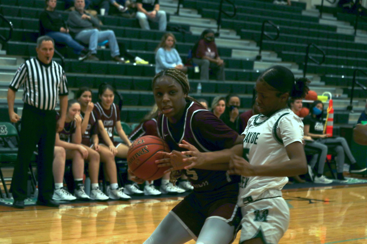 Cinco Ranch’s Aniya Foy backs down a defender during Friday’s District 19-6A game against Mayde Creek at the Mayde Creek gym.
