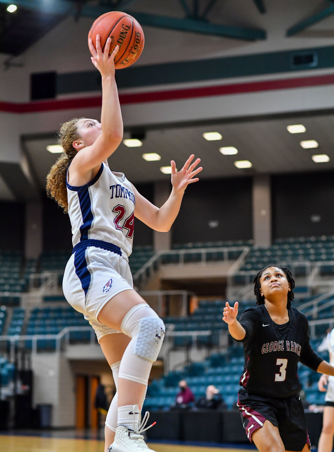 Katy Tx. Feb 15, 2022:  Tompkins Gabby Panter #24 drives to the basket during the Bi-District playoff, Tompkins vs George Ranch. (Photo by Mark Goodman / Katy Times)