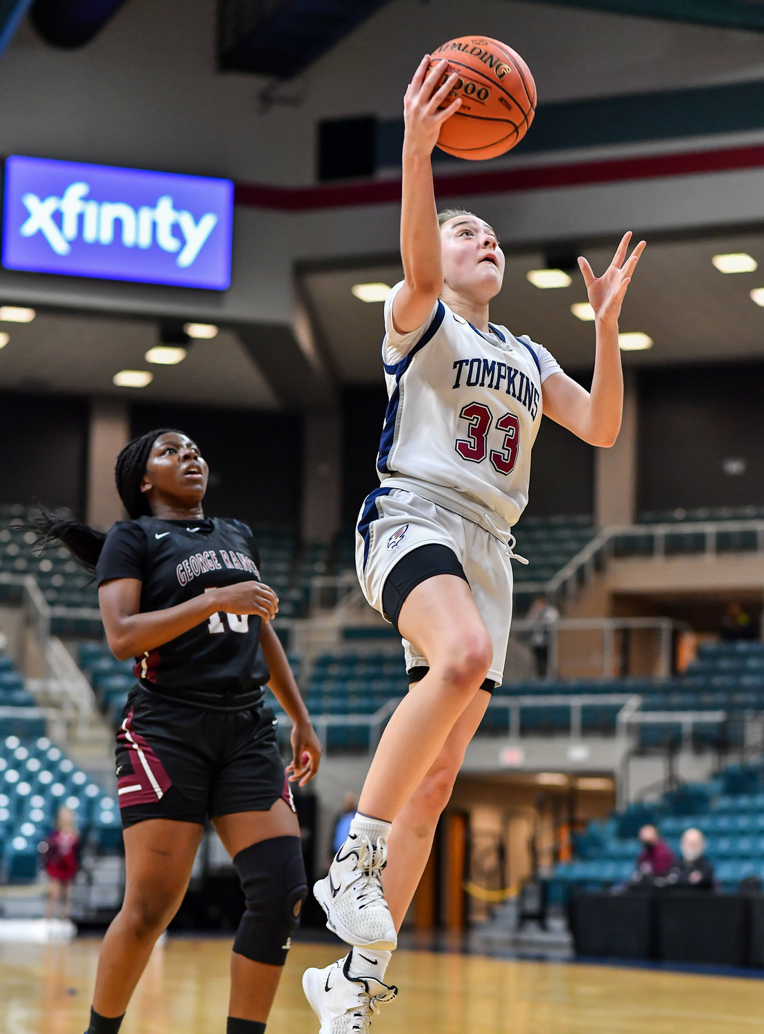 Katy Tx. Feb 15, 2022:  Tompkins Macy Spencer #33 drives to the basket during the Bi-District playoff, Tompkins vs George Ranch. (Photo by Mark Goodman / Katy Times)
