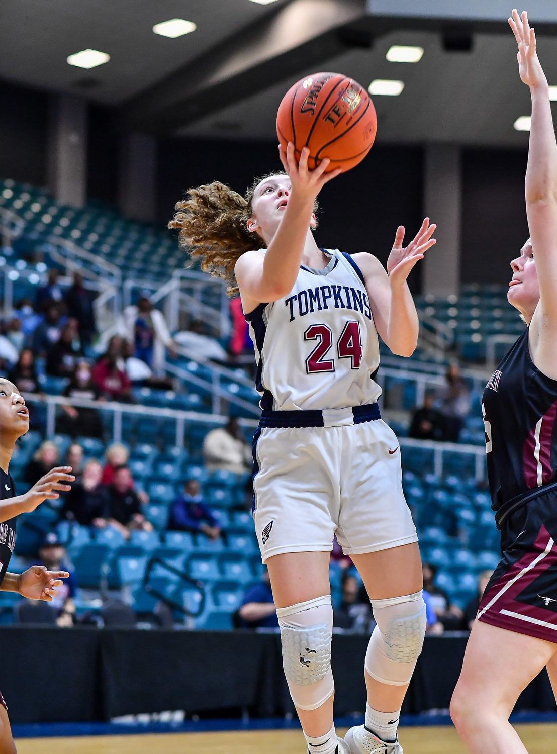 Katy Tx. Feb 15, 2022: Tompkins Gabby Panter #24 drives to the basket scoring for the Falcons during the Bi-District playoff, Tompkins vs George Ranch. (Photo by Mark Goodman / Katy Times)