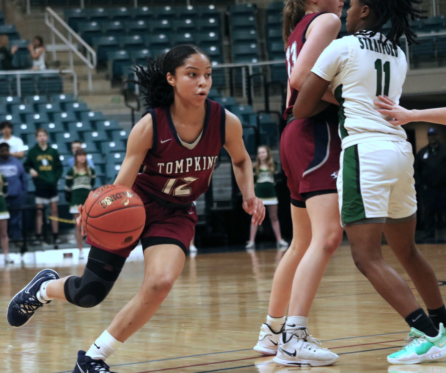 Brooklynn Nash dribbles past a defender during Friday’s game between Tompkins and Stratford at the Merrell Center.