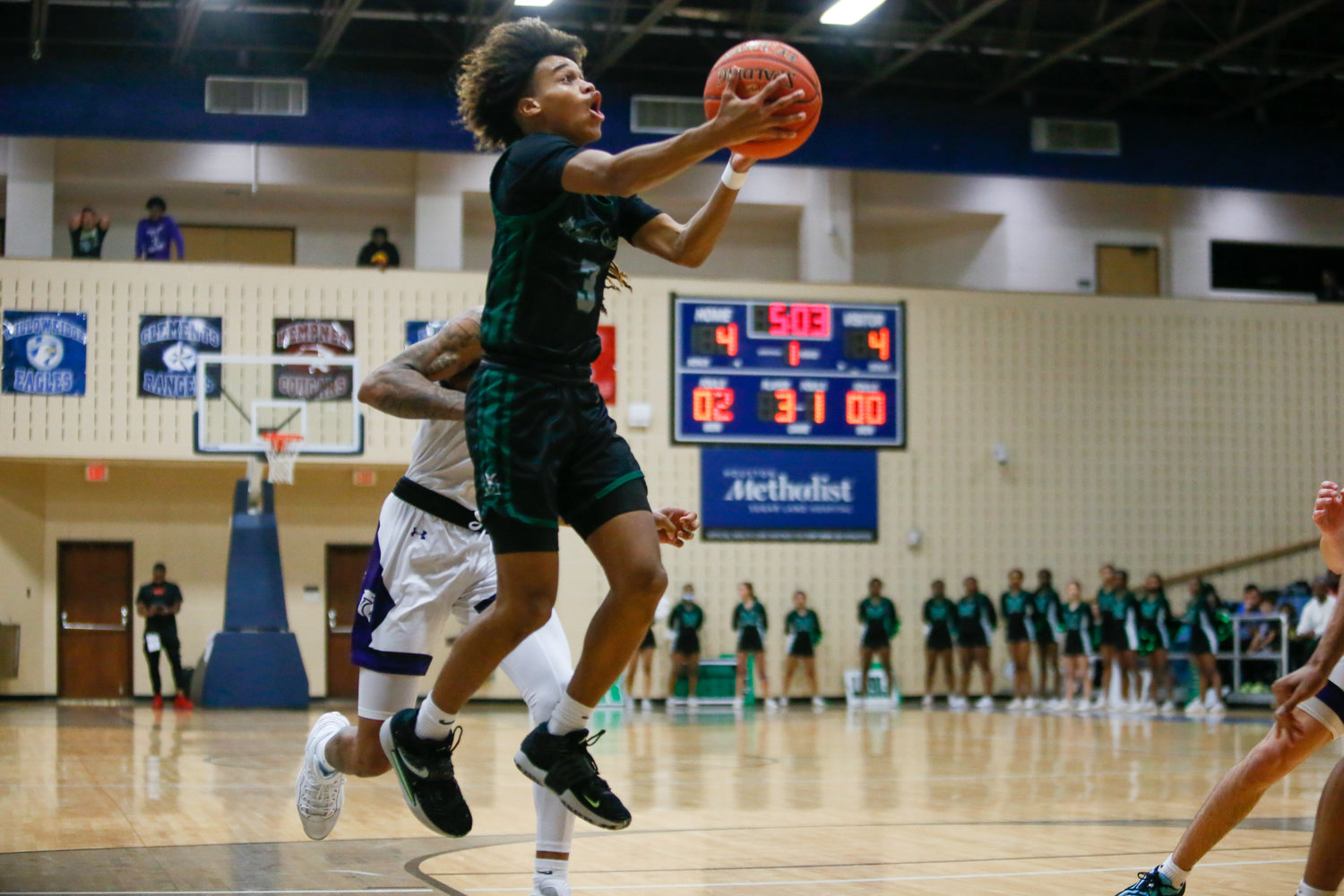 Christian Jones shoots a layup during Tuesday's game against Ridge Point.