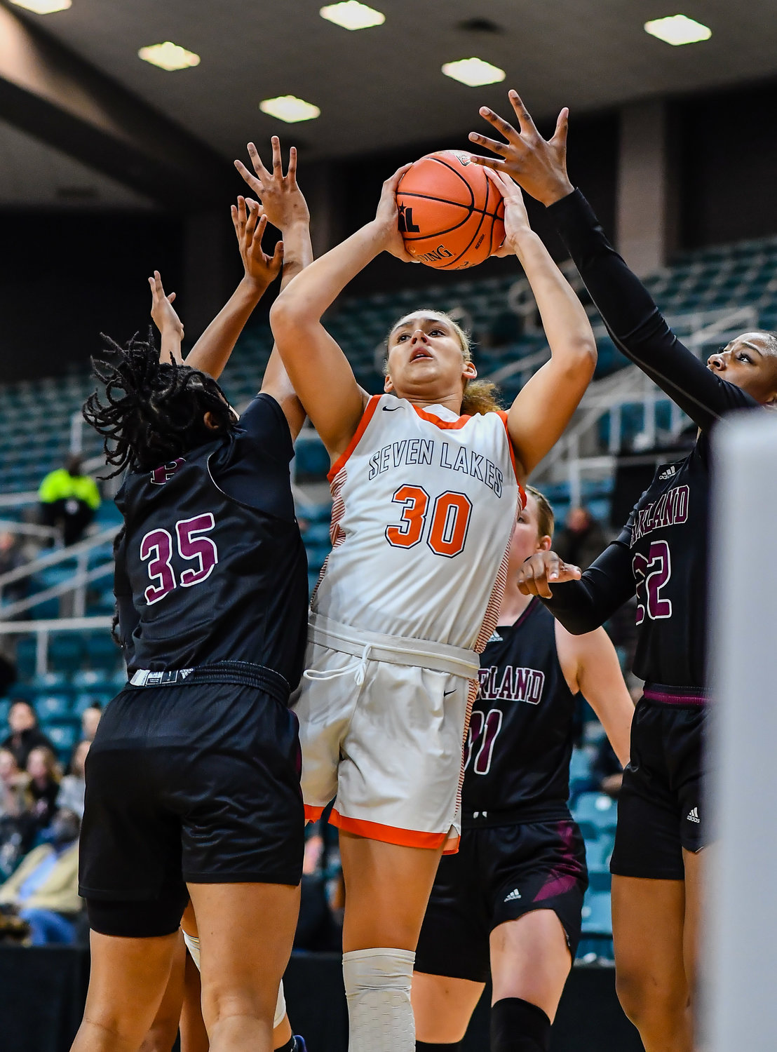 Katy Tx. Feb 25, 2022:  Seven Lakes Justice Carlton #30 goes up for the shot during the Regional SemiFinal playoff game, Seven Lakes vs Pearland at the Merrell Center. (Photo by Mark Goodman / Katy Times)