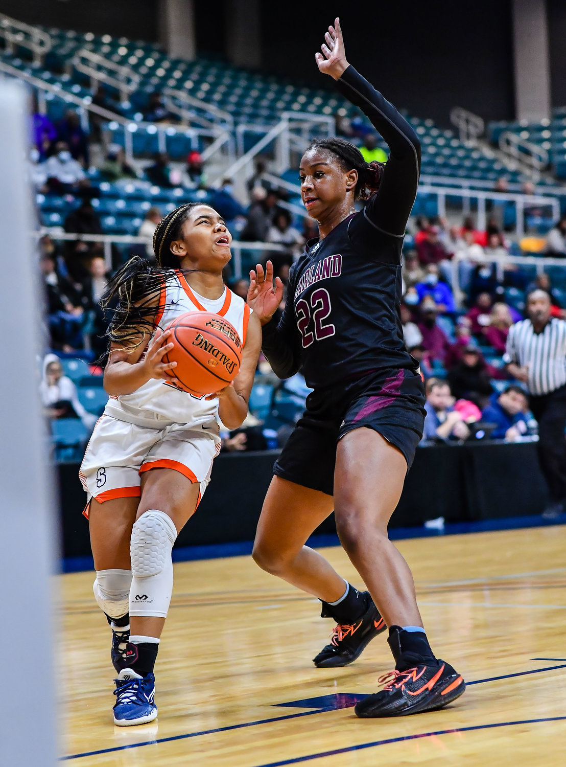 Katy Tx. Feb 25, 2022:  Seven Lakes Lenore Hudspeth #23 drives to the basket during the Regional SemiFinal playoff game, Seven Lakes vs Pearland at the Merrell Center. (Photo by Mark Goodman / Katy Times)