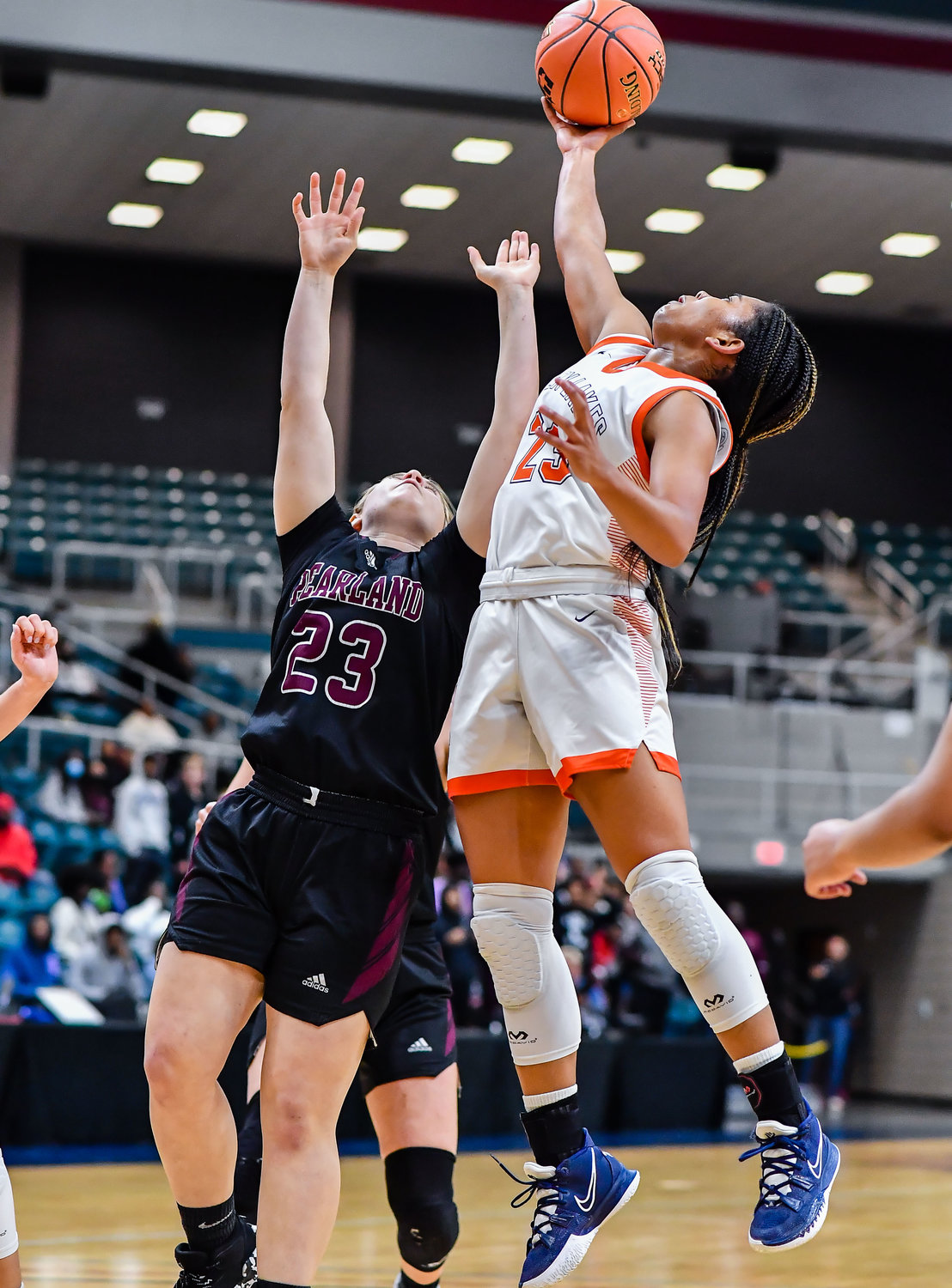 Katy Tx. Feb 25, 2022:  Seven Lakes Lenore Hudspeth #23 goes up for the rebound during the Regional SemiFinal playoff game, Seven Lakes vs Pearland at the Merrell Center. (Photo by Mark Goodman / Katy Times)