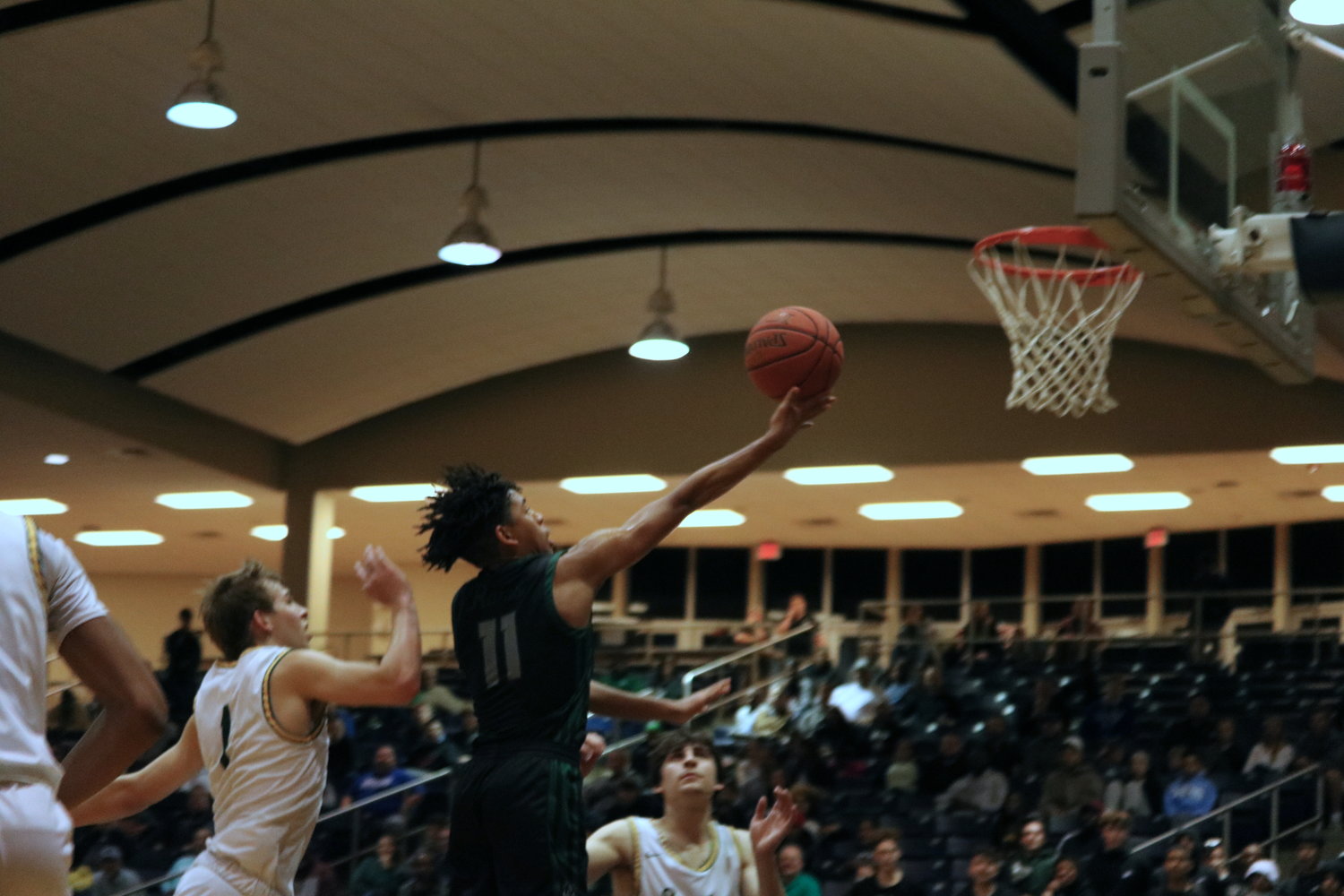 Larison Lamette shoots a layup during Friday’s game between Mayde Creek and Stratford at the Coleman Coliseum.