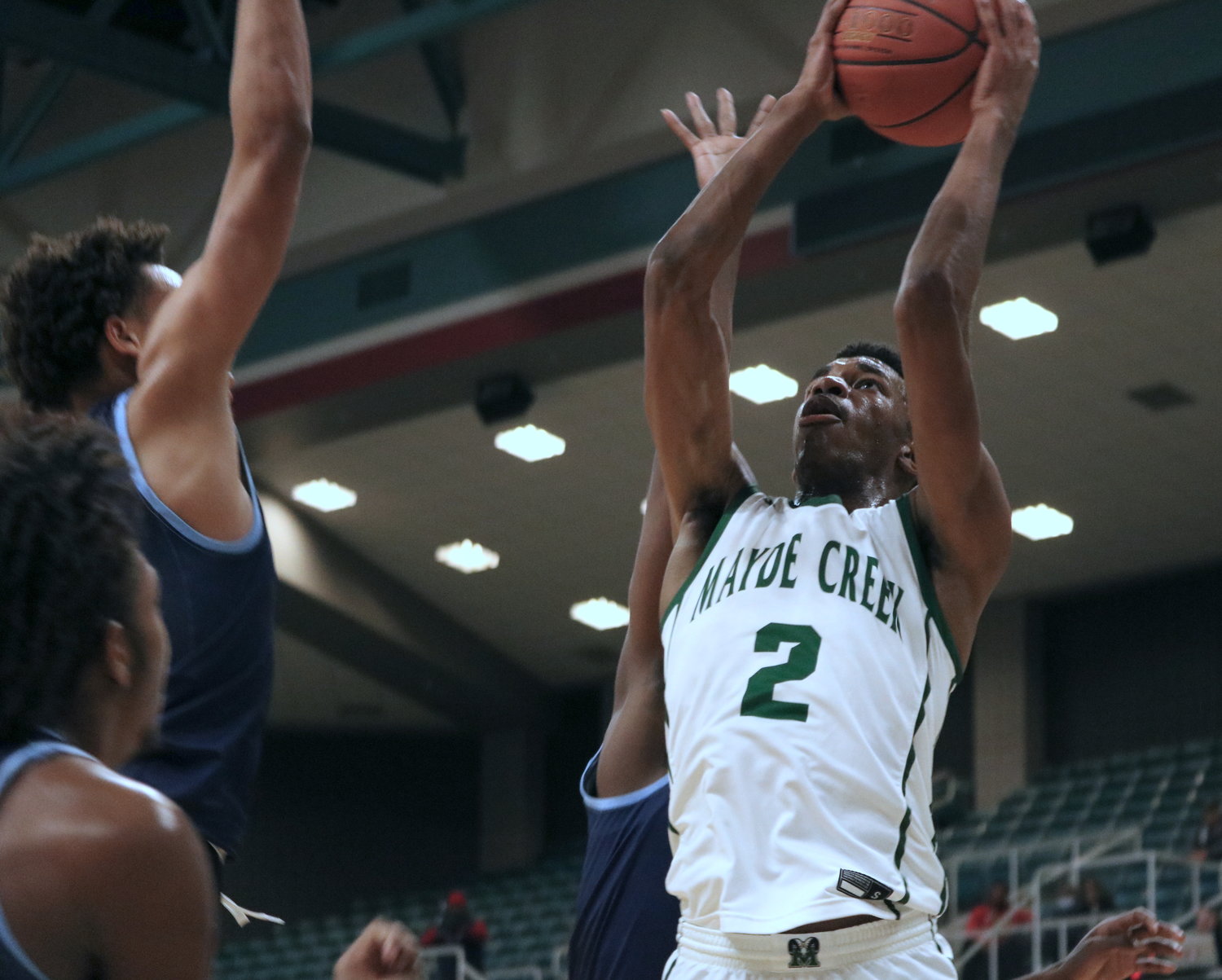 Caleb Davis shoots a layup during Tuesday’s Class 6A regional quarterfinal between Mayde Creek and Fort Bend Clements at the Merrell Center.