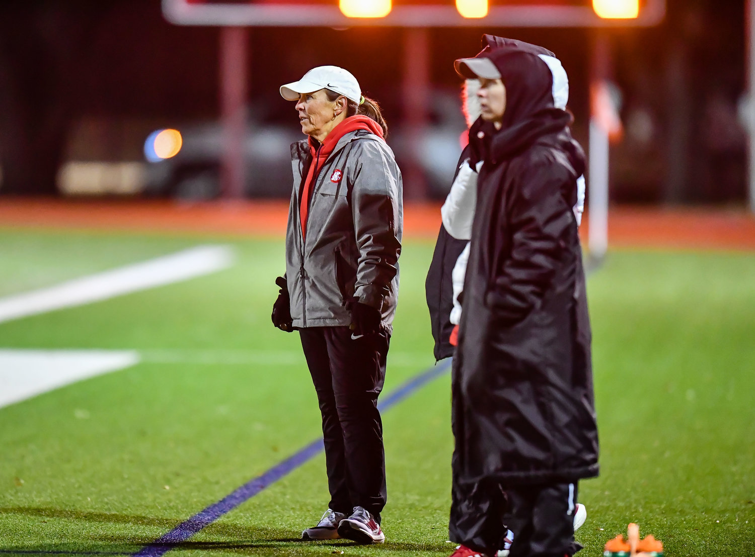 March 8,, 2022: Katy's head coach Dianne Loftin looks on at her lady Tigers during their soccer match against Katy Taylor. (Photo by Mark Goodman / Katy Times)