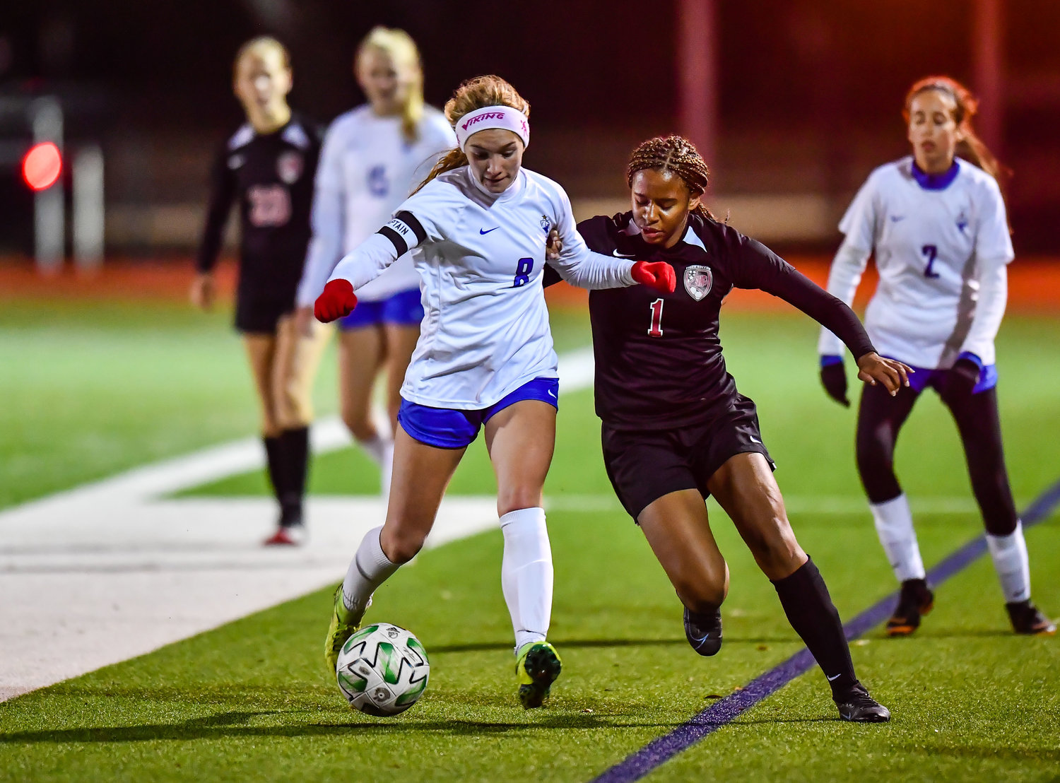March 8, 2022:  Taylors Chauner Clausing and Katy's Olyvia Witham #1 scramble for the ball during the Katy vs Katy Taylor soccer match at KHS. (Photo by Mark Goodman / Katy Times)