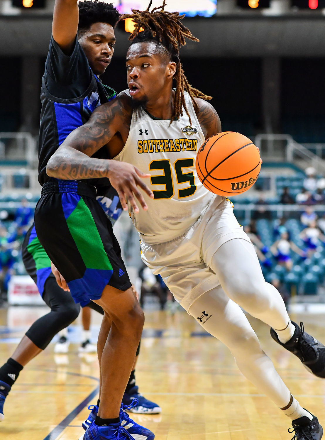 March 12,, 2022:  Southeastern Louisianas Gus Okafor #35 drives to the basket during the Southland Conference Basketball Championship game between A&M Corpus Christi vs Southeastern Louisiana. (Photo by Mark Goodman / Katy Times)
