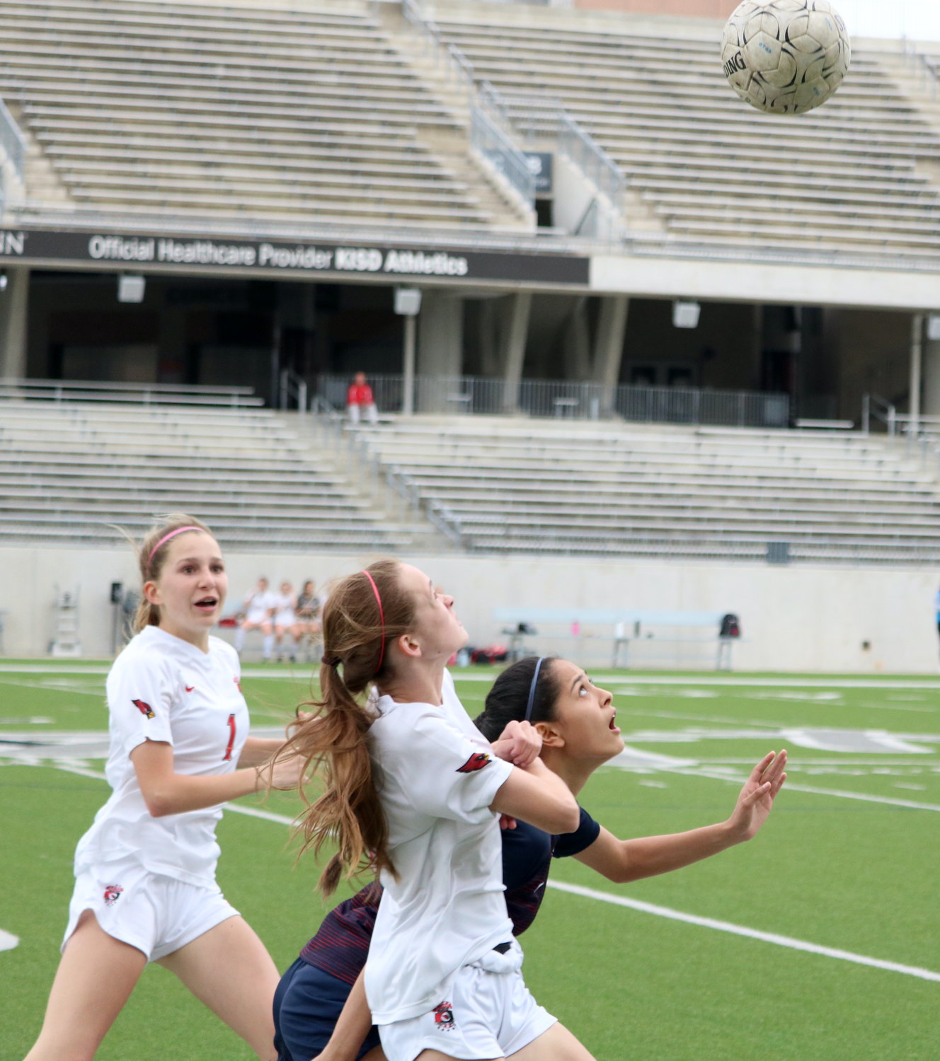Rosa Reyes fights for a header during Tuesday’s Class 6A area round game between Tompkins and Bellaire at Legacy Stadium.