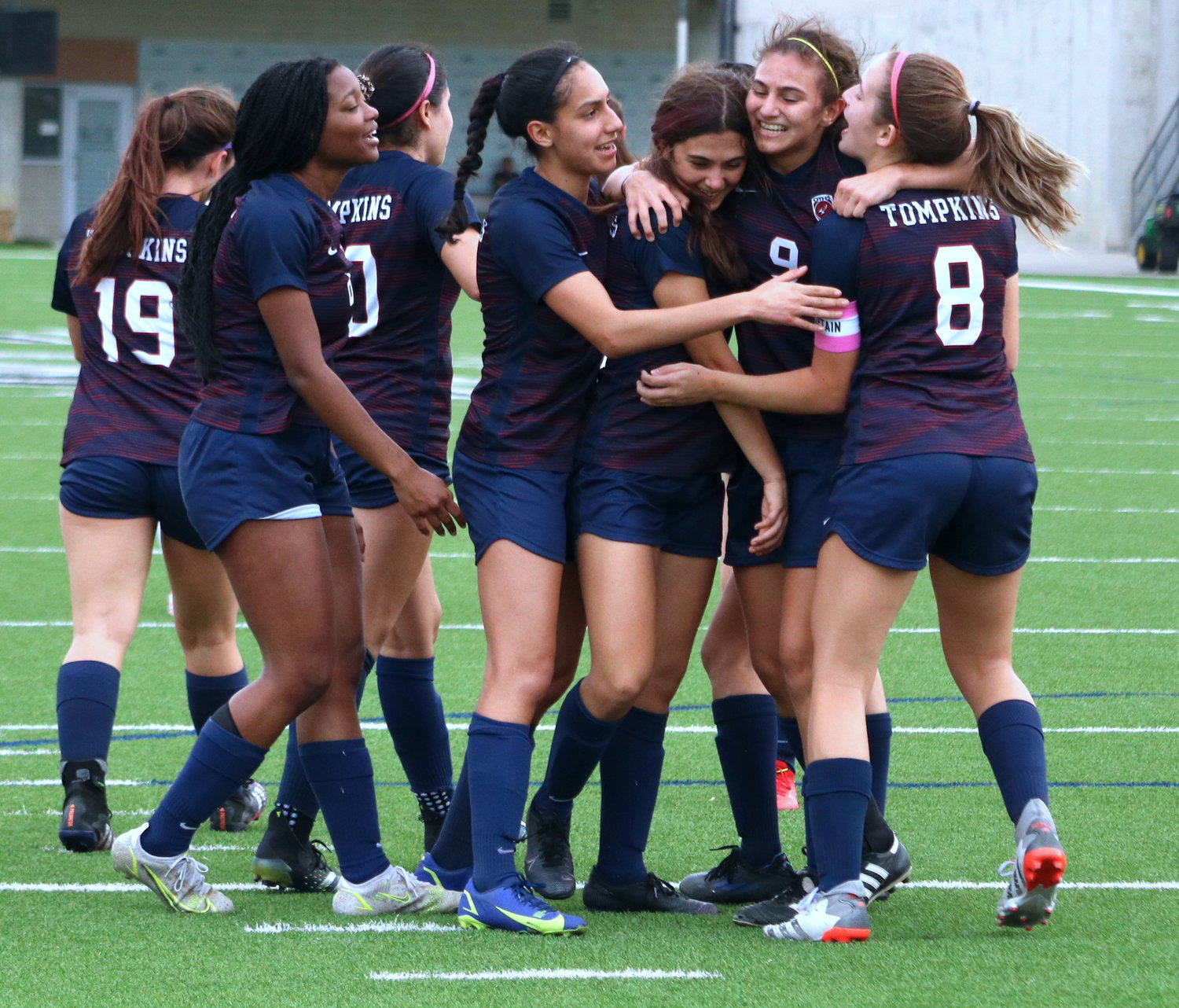 Tompkins’ players celebrate after a Valentina Gianinetto goal during Tuesday’s Class 6A area round game between Tompkins and Bellaire at Legacy Stadium.