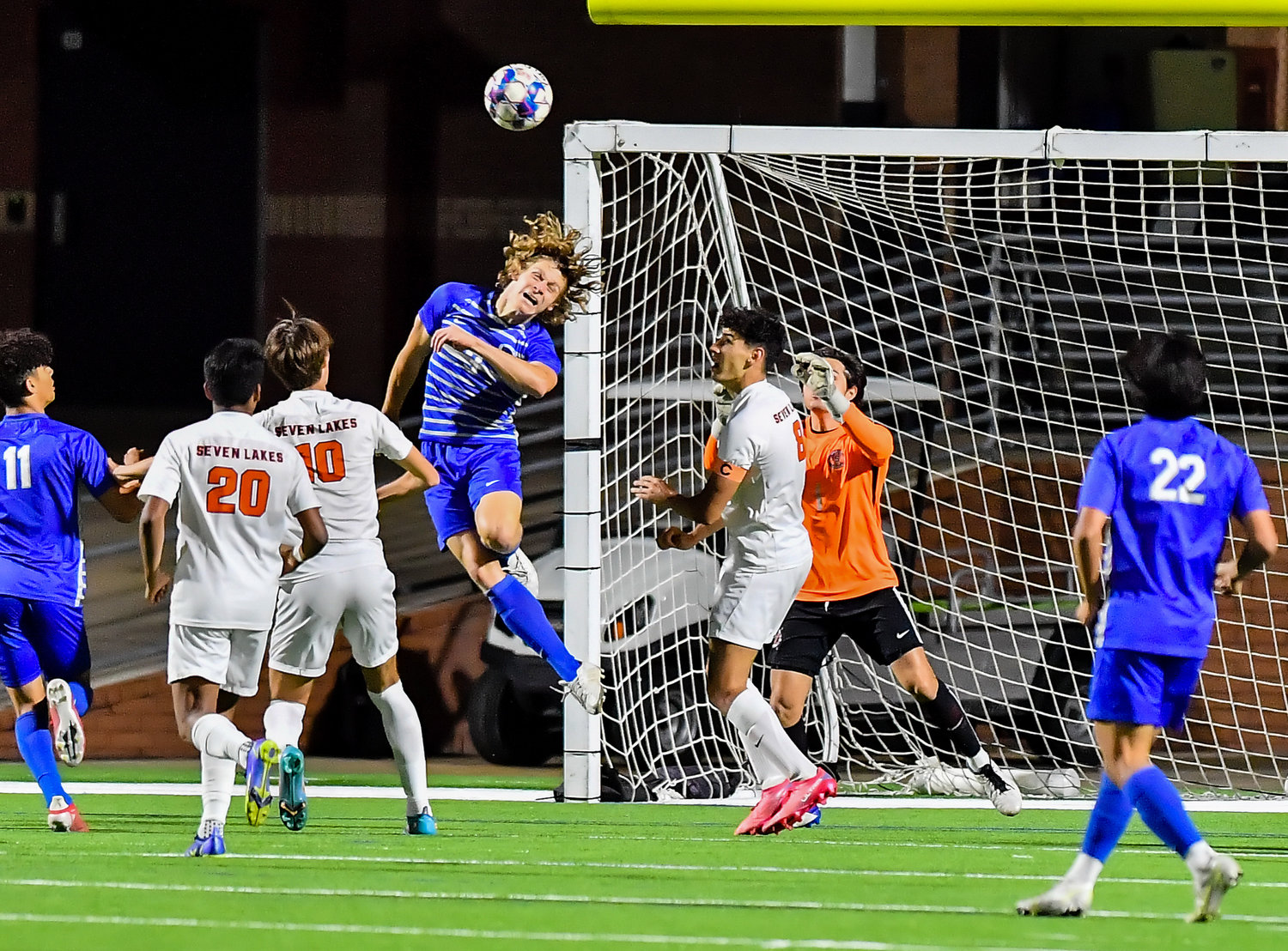 April 1, 2022: Katy Taylors Luke Skelton #3 heads the ball as he tries to score for the Mustangs during Regional Quarterfinal soccer playoff, Seven Lakes vs Katy Taylor at Rhode Stadium. (Photo by Mark Goodman / Katy Times)