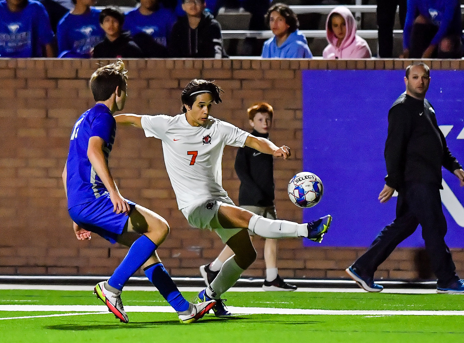 April 1, 2022: Seven Lakes Noa Stasic #7 passes the ball off during Regional Quarterfinal soccer playoff, Seven Lakes vs Katy Taylor at Rhode Stadium. (Photo by Mark Goodman / Katy Times)