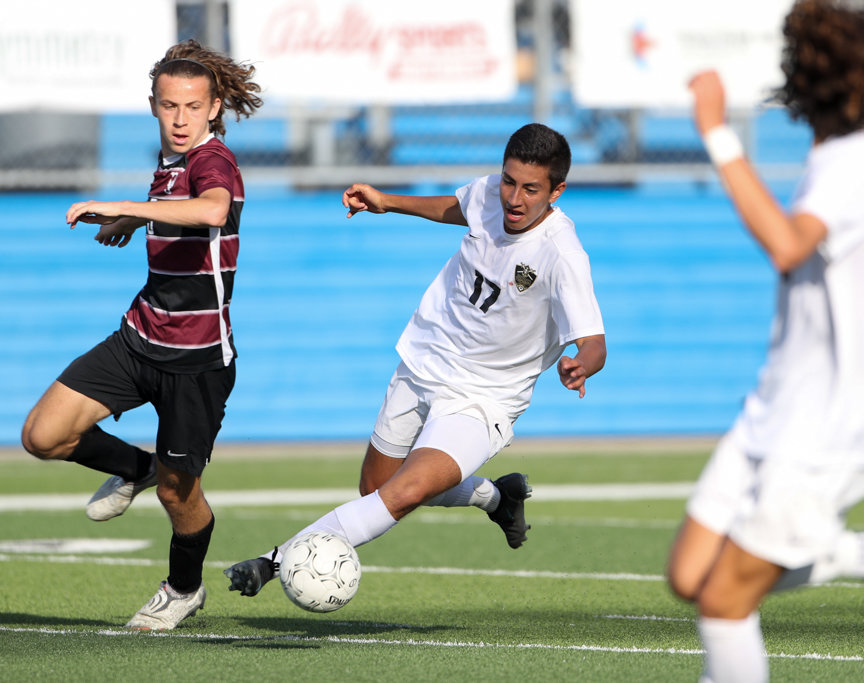 Jordan midfielder Ryan Armijo (17) passes the ball during the Class 5A boys state semifinal between Dripping Springs and Katy Jordan on April 14, 2022 in Georgetown, Texas.