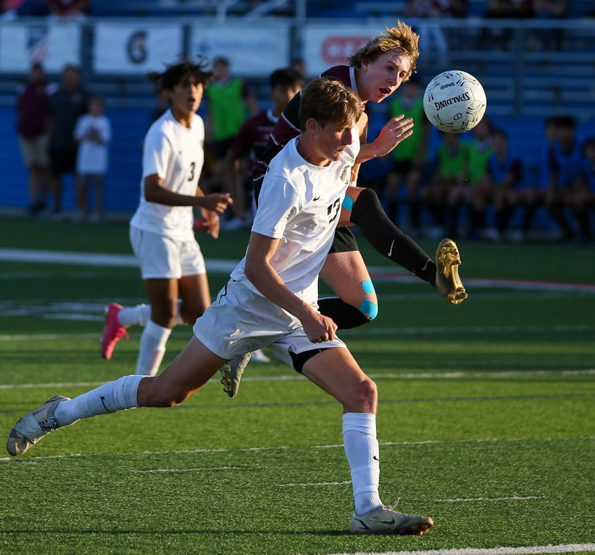 Dripping Springs midfielder Adam Knutson (2) shoots and scores the game-winning goal during the Class 5A boys state semifinal between Dripping Springs and Katy Jordan on April 14, 2022 in Georgetown, Texas.