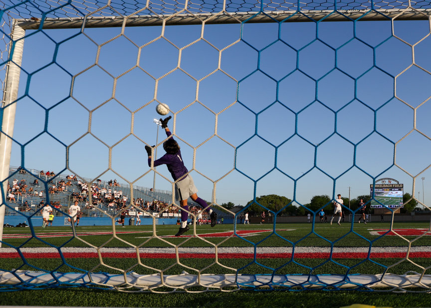 Jordan goalkeeper Elijah Betancourt (1) leaps to make a save during the Class 5A boys state semifinal between Dripping Springs and Katy Jordan on April 14, 2022 in Georgetown, Texas.