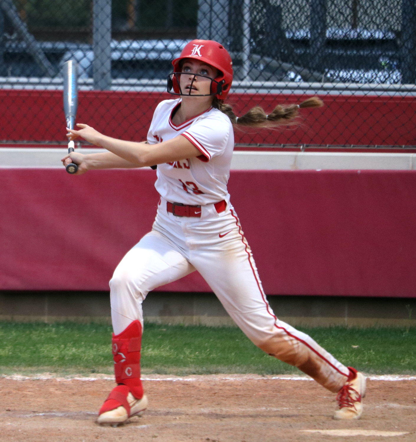 Kailey Wyckoff watches after hitting a ball to left field during a game between Katy and Taylor at the Katy softball field.