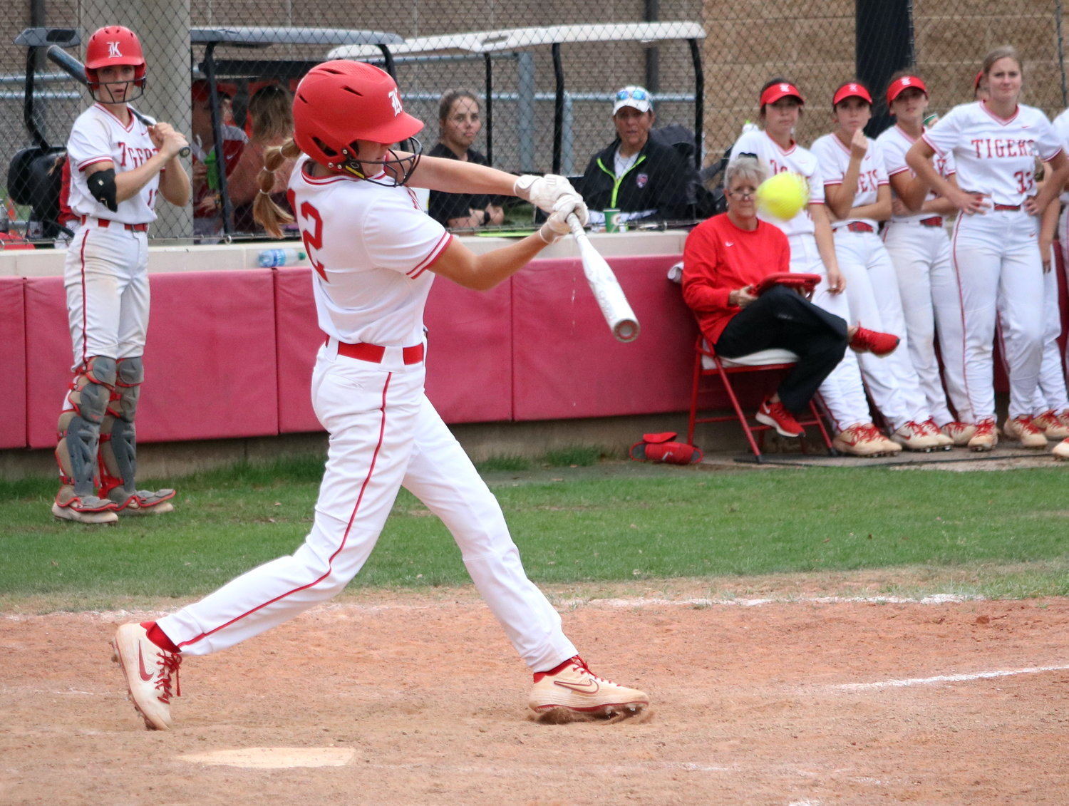 Avery Porter hits during Tuesday’s game between Katy and Taylor at the Katy softball field.