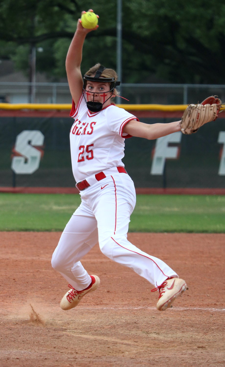 Cameryn Harrison pitches during Tuesday’s game between Katy and Taylor at the Katy softball field.