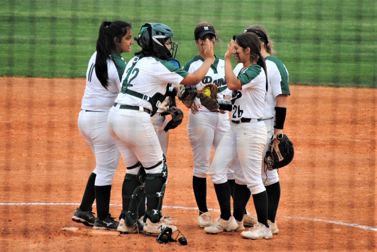 Mayde Creek players talk during a game against Seven Lakes.