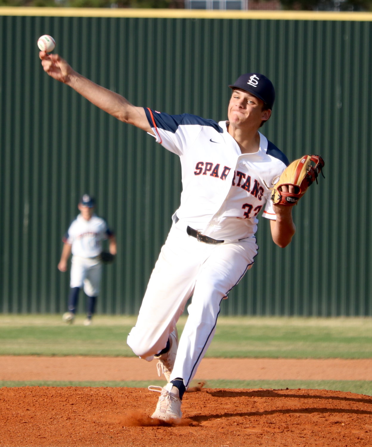 Nathan Johnson pitches during Friday’s District 19-6A  game between Seven Lakes and Cinco Ranch at the Seven Lakes baseball field.