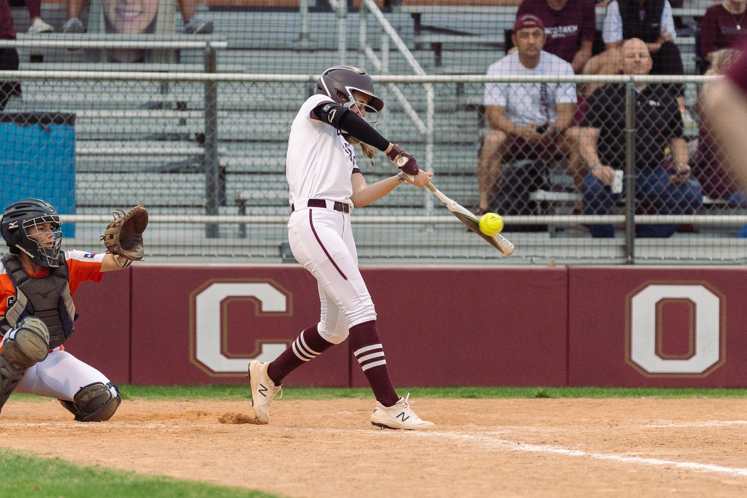 A Cinco Ranch hits during a District 19-6A game against Seven Lakes.