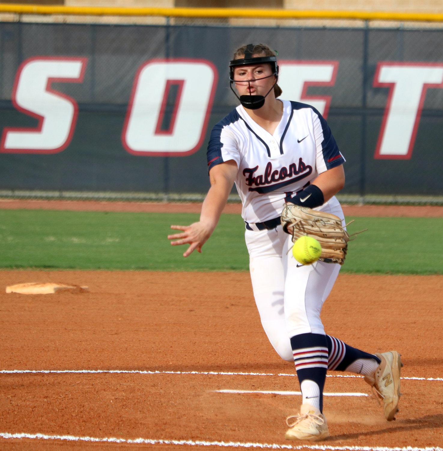 Samantha Crumrin pitches during a bi-district game between Tompkins and George Ranch at the Tompkins softball field.