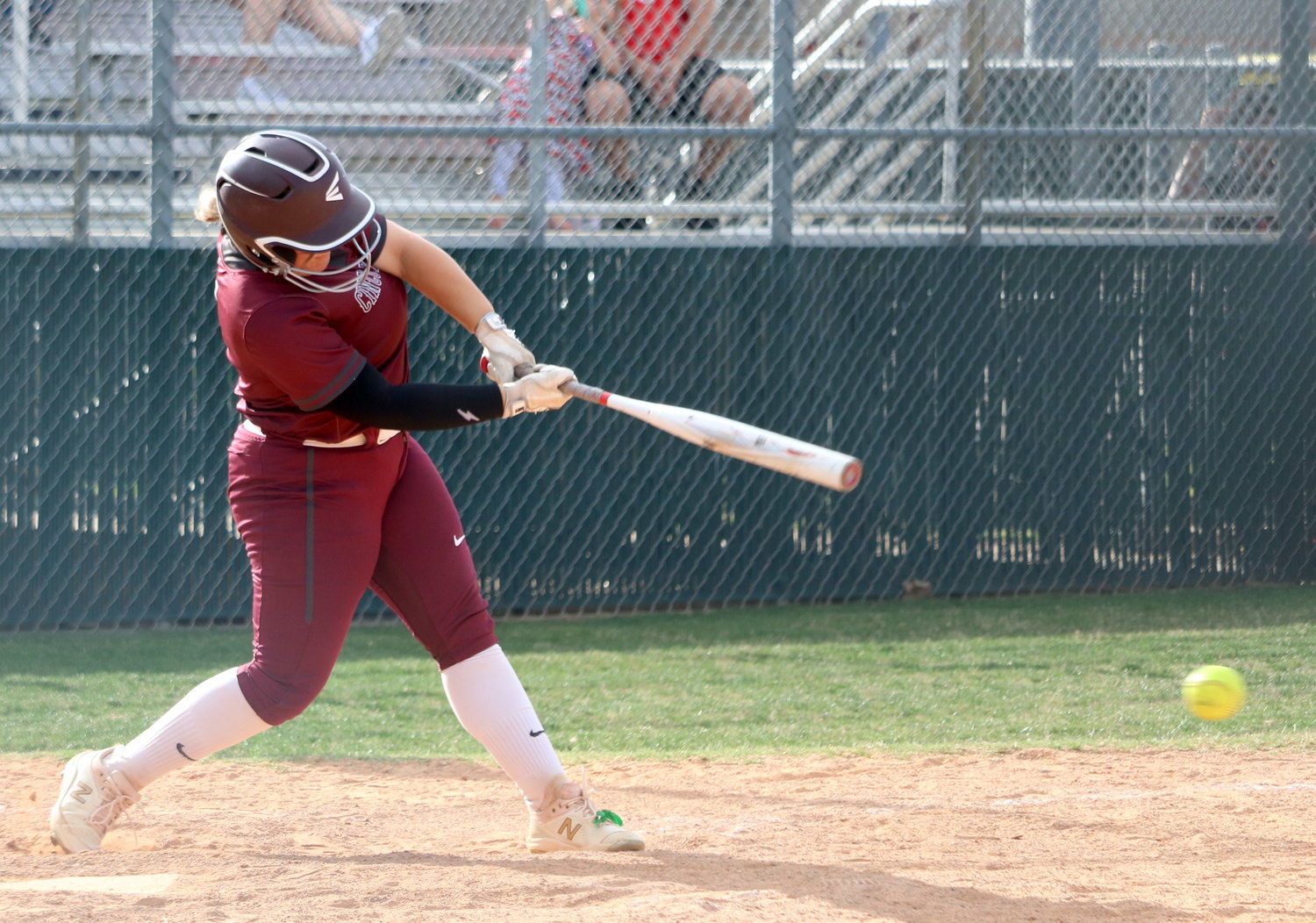 Amanda Croteau hits during Friday’s bi-district game between Cinco Ranch and Fort Bend Travis.