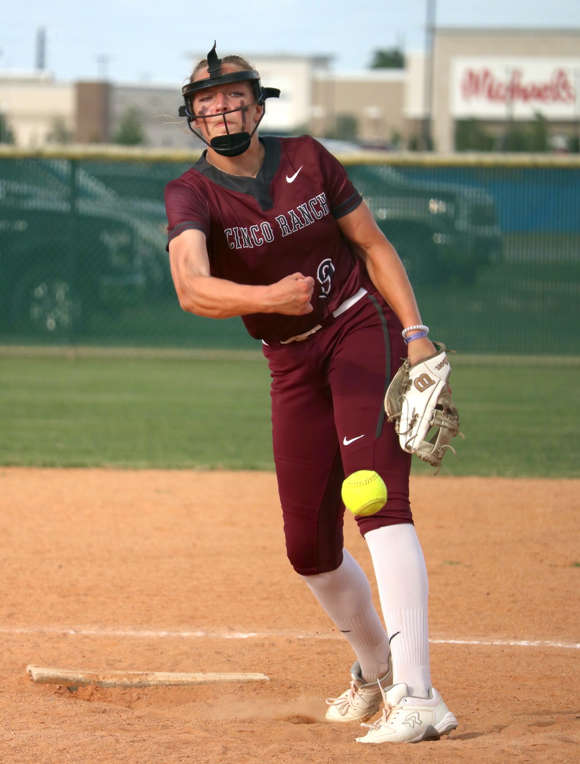 Chela Kovar pitches during Friday’s bi-district game between Cinco Ranch and Fort Bend Travis.