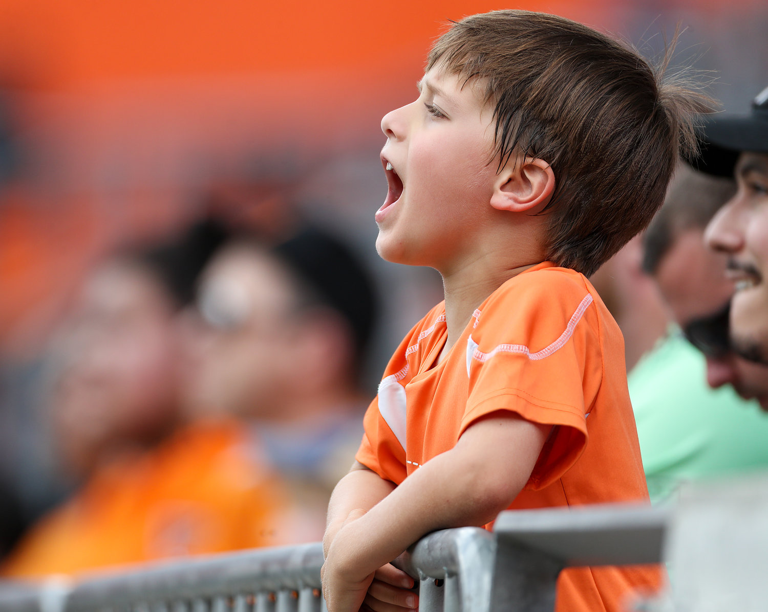 A young Houston Dynamo fan cheers during the first half of a Major League Soccer match between the Houston Dynamo and Austin FC on April 30, 2022 in Houston, Texas.