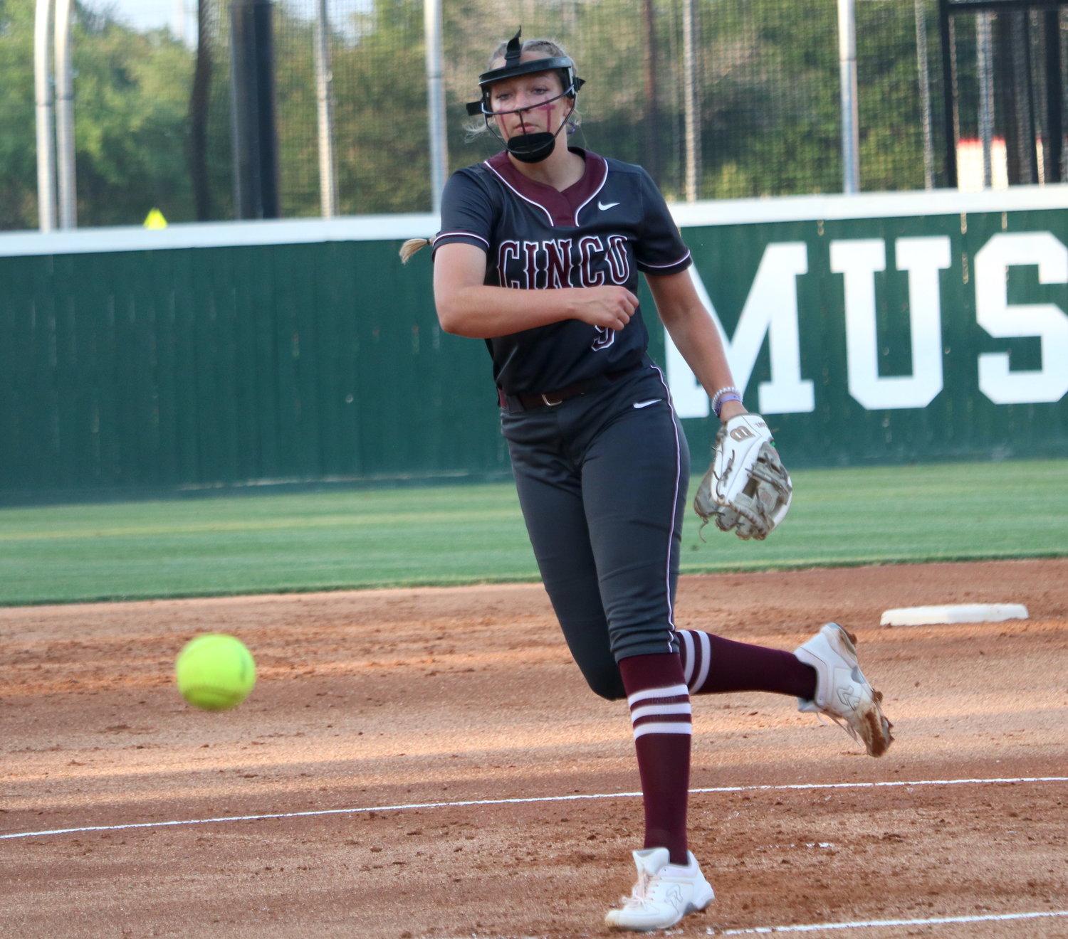 Chela Kovar pitches during Friday's area round game between Cinco Ranch and Heights at Memorial High School.