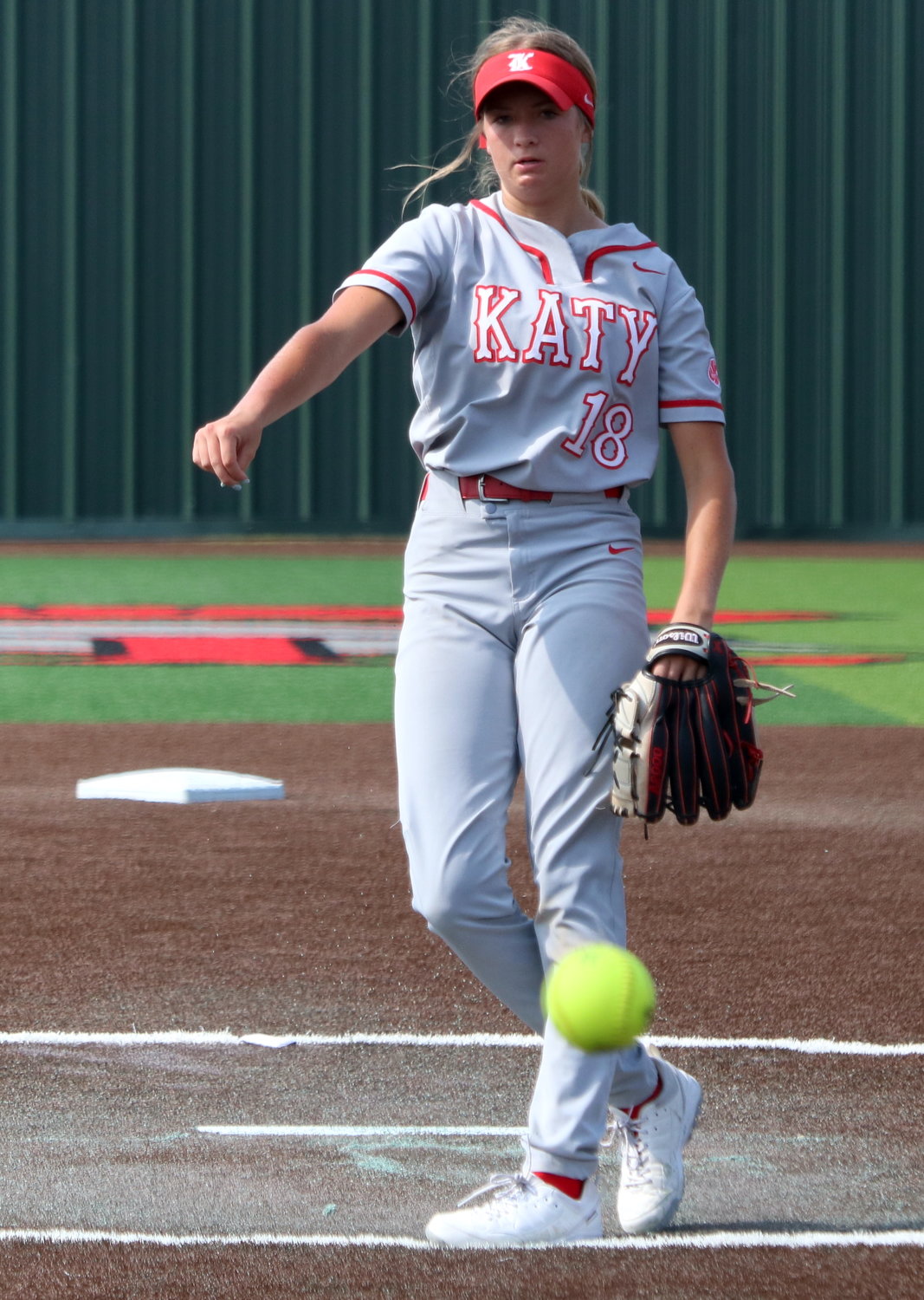 Lauryn Soeken pitches during Saturday’s area round game between Katy and Cy-Fair at Cy-Lakes.