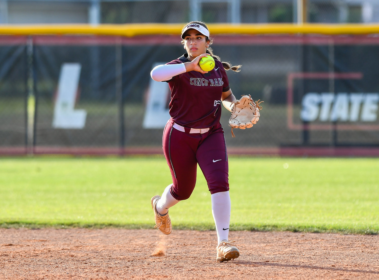 May 13, 2022: Cinco Ranch's Gissel Morales #7 makes the catch for an out during the Regional Quarterfinal playoff between Katy and Cinco Ranch at Katy HS. (Photo by Mark Goodman / Katy Times)
