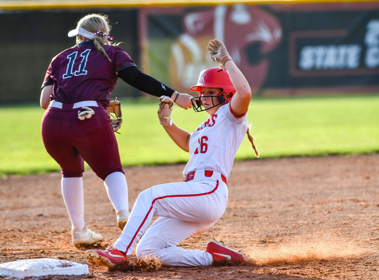 May 13, 2022: Katy's Hailey Gore #16 slides safely into third base during the Regional Quarterfinal playoff between Katy and Cinco Ranch at Katy HS. (Photo by Mark Goodman / Katy Times)