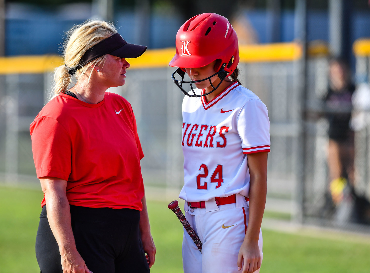 May 13, 2022: Katy's assistant coach Meghan Burrell chats with Katy's Ashlee Piraneo #24 during the Regional Quarterfinal playoff between Katy and Cinco Ranch at Katy HS. (Photo by Mark Goodman / Katy Times)