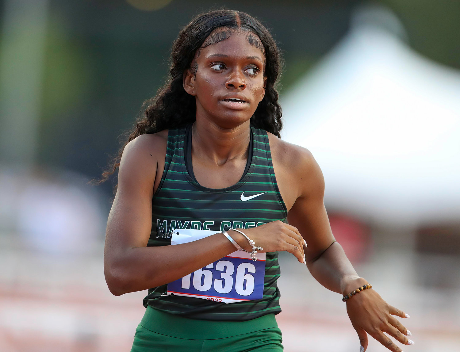 Simone Ballard of Mayde Creek looks up at the scoreboard after running in the Class 6A girls 300-meter hurdles at the UIL State Track and Field Meet on May 14, 2022 in Austin, Texas. Ballard earned a gold medal in the event with a time of 41.11.